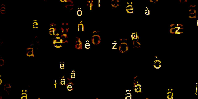 A jumble of glowing characters with accents on a black background.