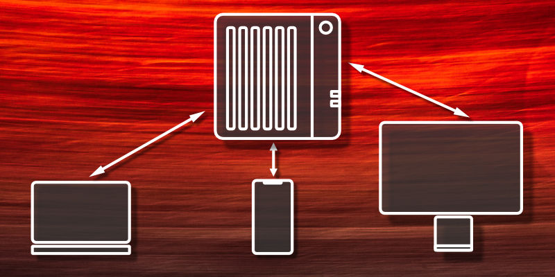 Iconised depictions of laptop, mobile and desktop pointing towards a NAS unit.